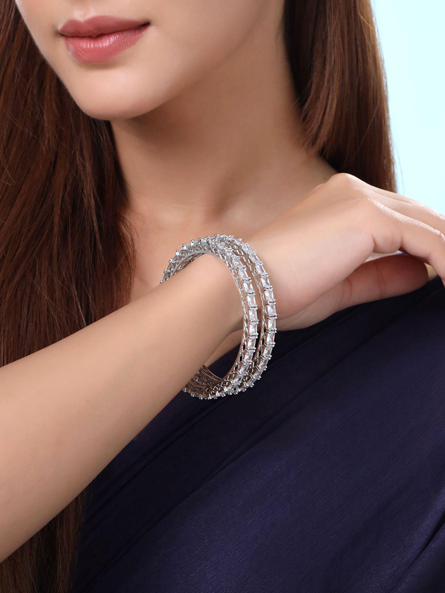 silver tone white ad studded bangles