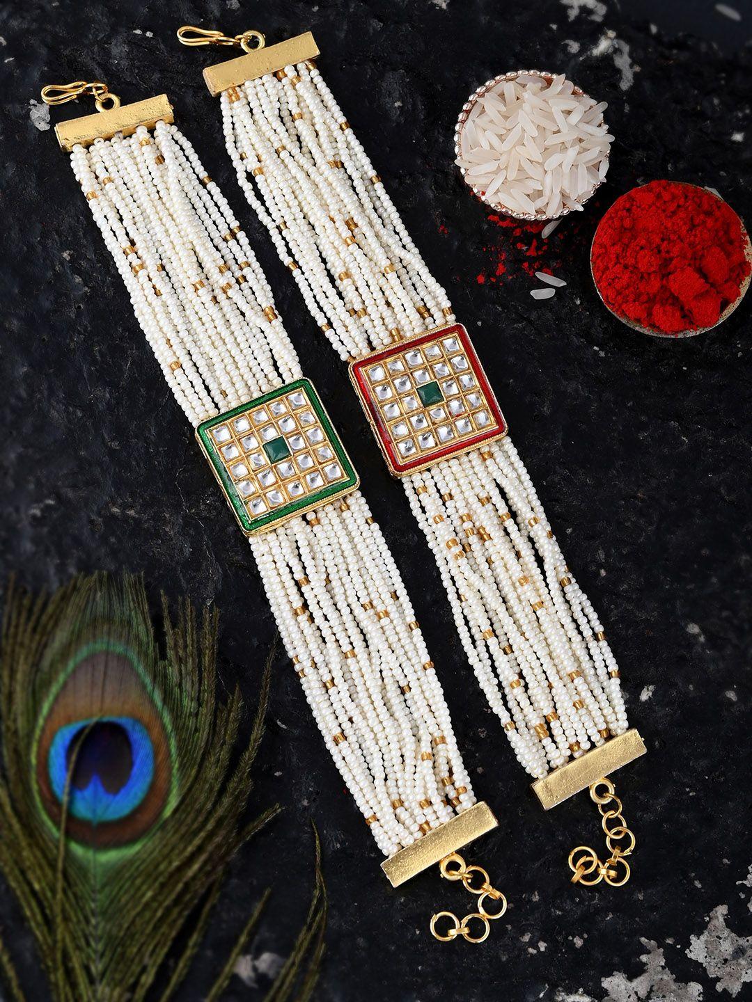 silvermerc designs women set of 2 gold-plated green kundan-studded rakhi