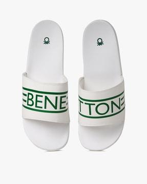 sip-on sandals with typographic branding