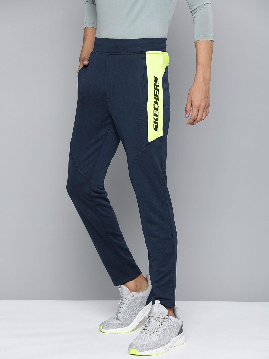 skechers men regular fit mid-rise colourblocked skechtech track pants