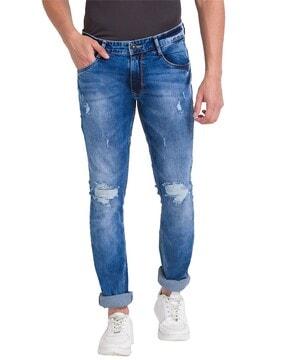 skinny fit distressed jeans