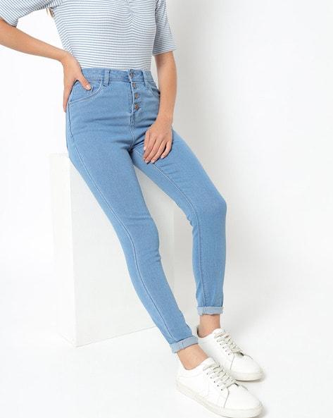skinny fit jeans with button closures