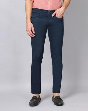 skinny fit flat-front trousers