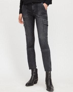 skinny fit light washed jeans with flap pockets