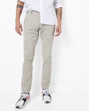 skinny fit mid-rise flat-front chinos