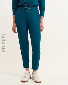 skinny fit pants with insert pockets