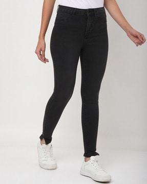 skinny jeans with button closure