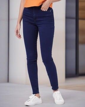 skinny jeans with button closure