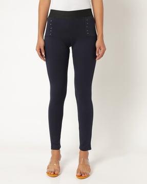 skinny treggings with rivet accents