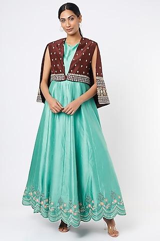 sky blue embroidered gown with cape