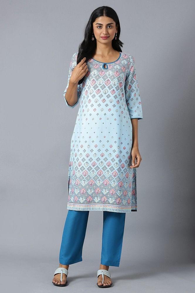 sky blue floral printed kurta in round neck with blue solid trousers