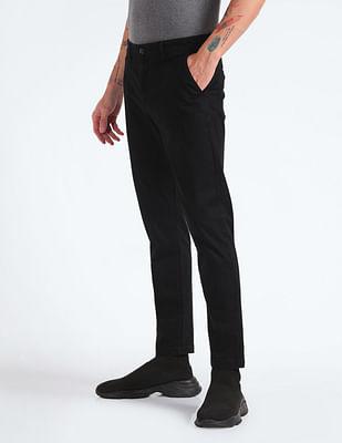 slash slim tapered fit solid trousers