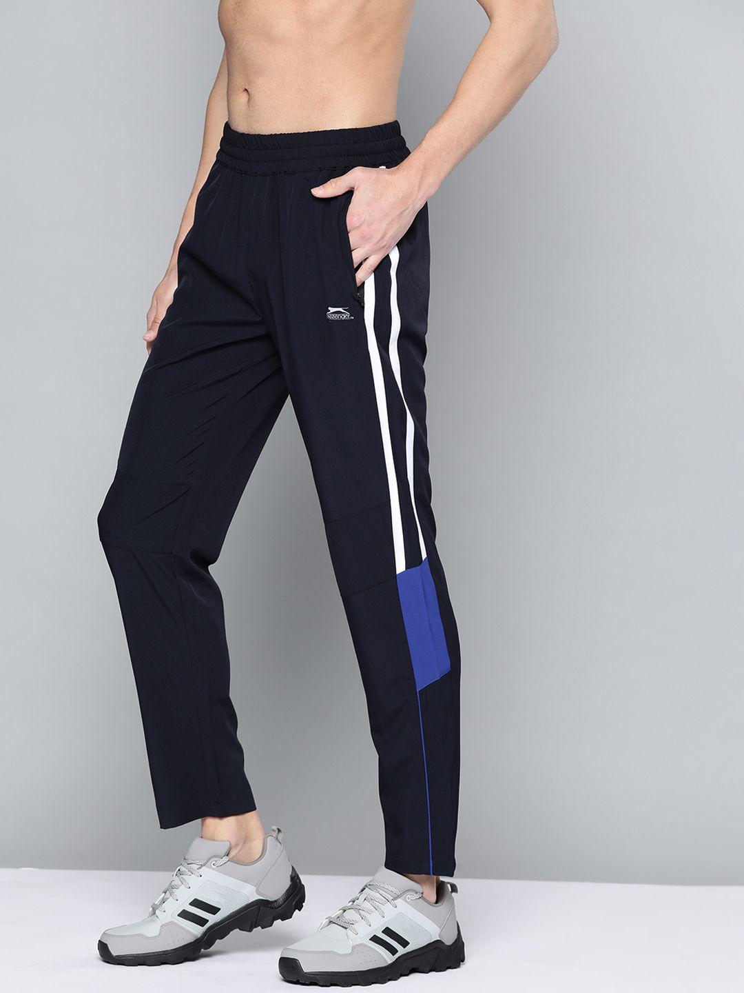 slazenger men navy blue solid track pants with side stripe detail