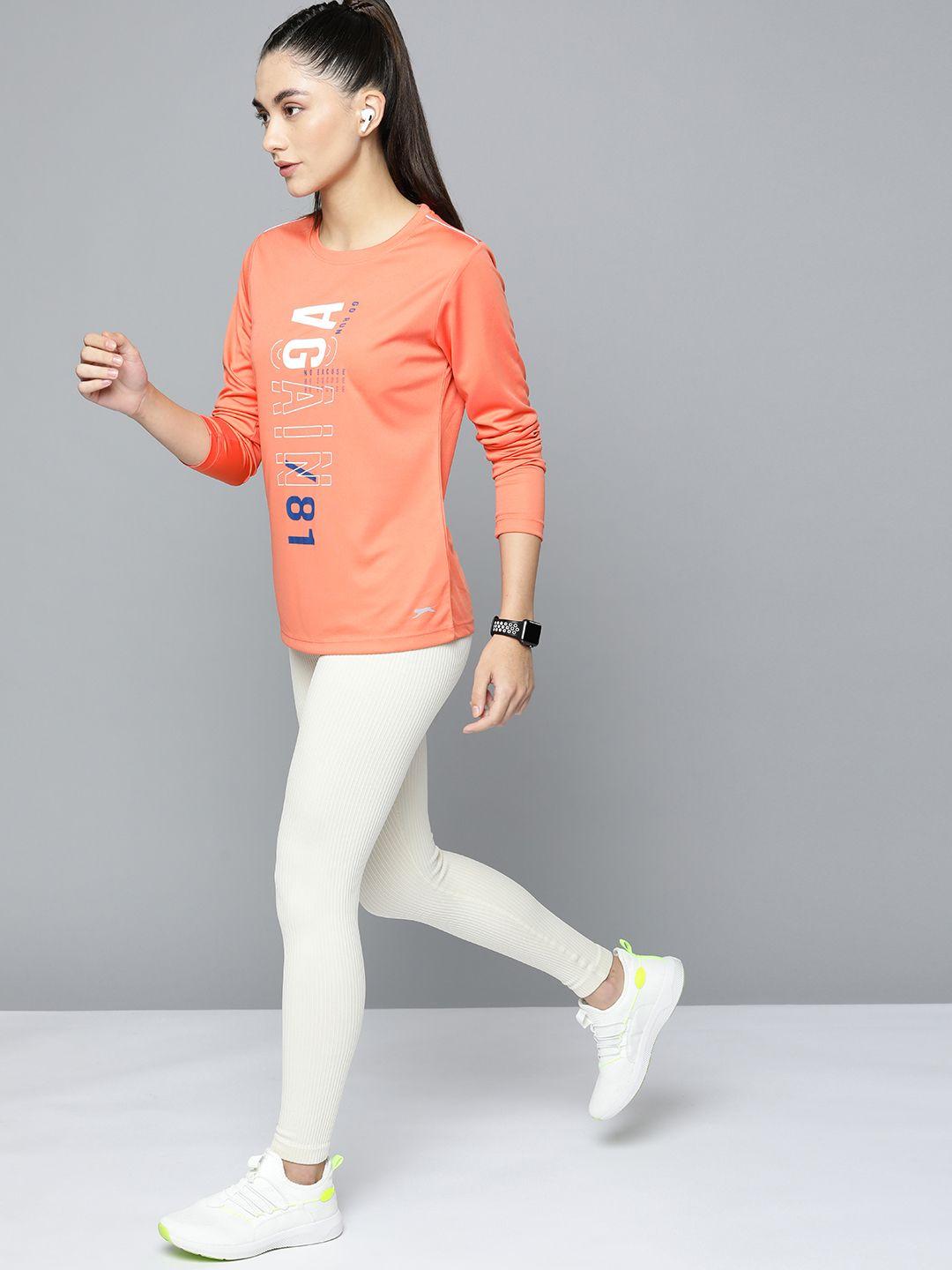 slazenger women peach-coloured printed running t-shirt with reflective detail