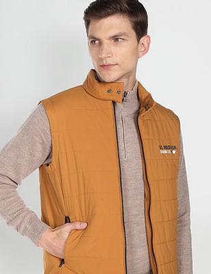 sleeveless solid quilted jacket