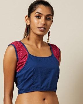 sleeveless back-open cotton blouse with ikat trims