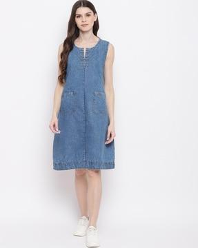 sleeveless shift dress with patch pockets