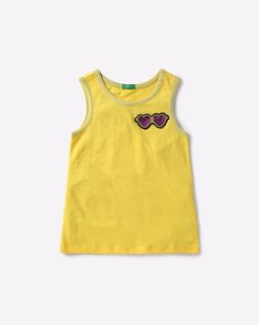 sleeveless top with applique