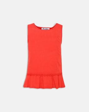 sleeveless top with ruffled accent