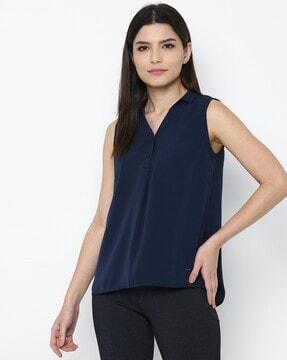 sleeveless top with spread collar