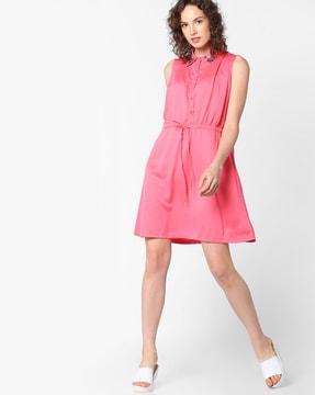 sleeveless tunic with button placket