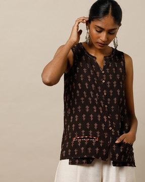 sleeveless tunic with front welt pockets