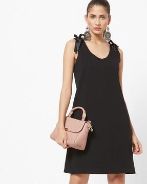 sleeveless tunic with tie-ups