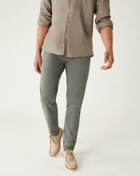 slim fit high-rise flat-front trousers