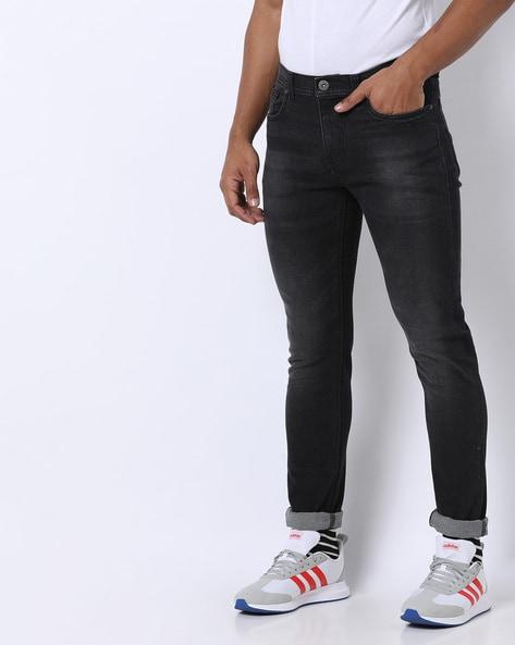 slim fit jeans with whiskers