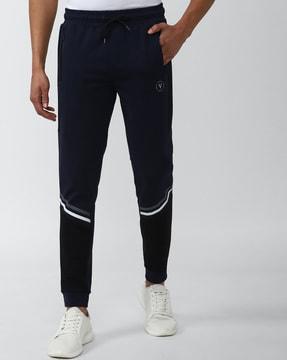 slim fit joggers with logo taping