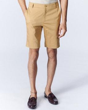 slim fit shorts with button closure
