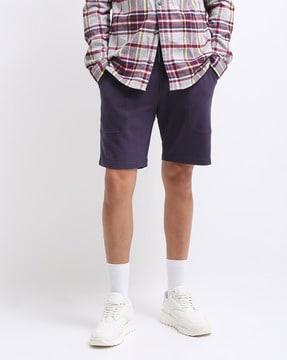 slim fit flat-front shorts