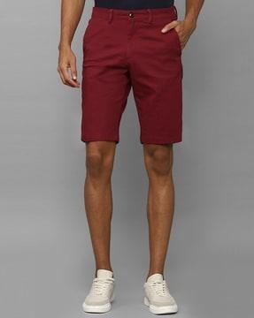 slim fit flat-front shorts