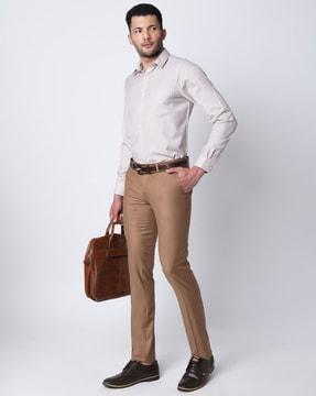 slim fit flat front trousers with insert pockets