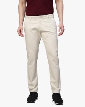 slim fit flat front trousers with insert pockets