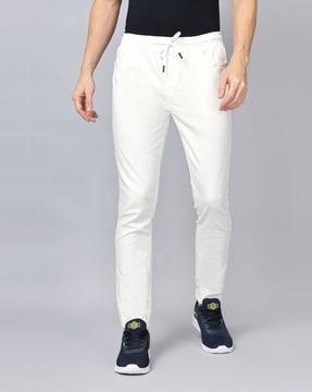 slim fit flat-front trousers