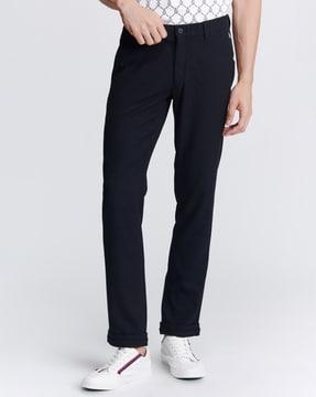 slim fit flat-front trousers