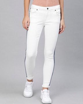 slim fit jeans with contrast piping