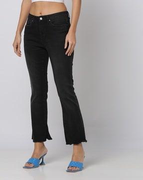 slim fit jeans with frayed hems