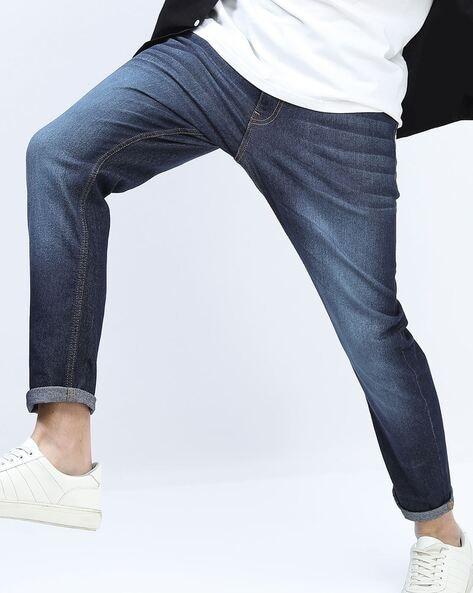 slim fit jeans with whiskers