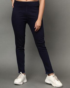 slim fit jeggings with frayed hems