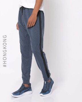 slim fit joggers with brand print side taping