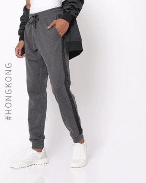 slim fit joggers with contrast side taping