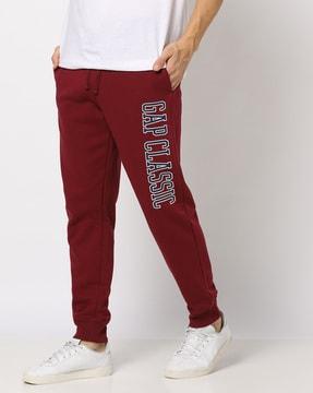 slim fit joggers with placement logo print