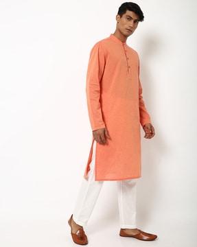 slim fit kurta with slip pockets