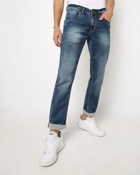 slim fit mid rise jeans with whiskers