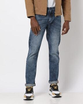 slim fit mid-wash jeans