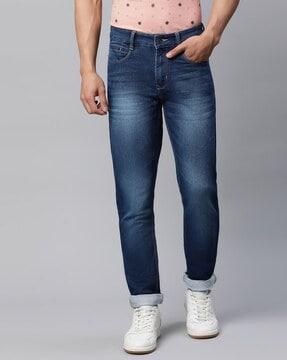 slim fit mid-wash mid-rise jeans