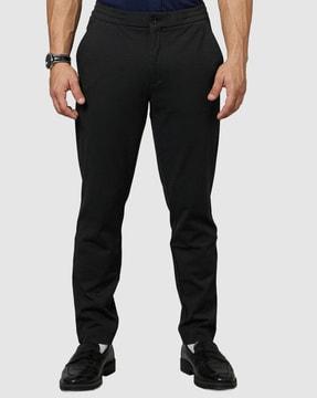 slim fit pants with button closure
