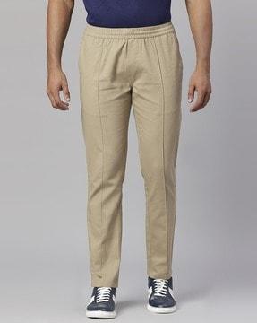 slim fit pleated trousers